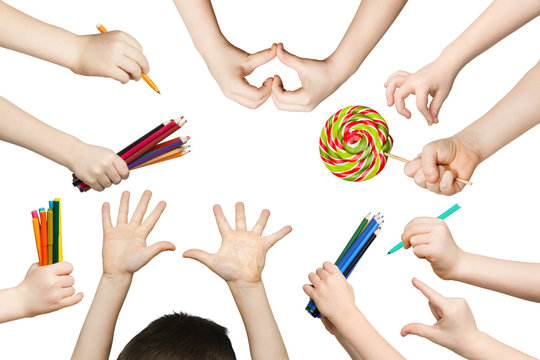 Set of child hands with pencils, lollipop