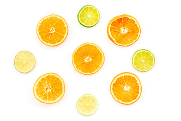 Obraz premium Fruit pattern. Oranges and lime round slices composition on white background top view