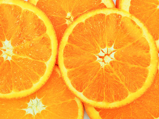 Slices of fresh orange texture background.