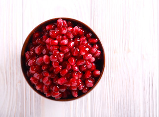 Pomegranate seeds in a bowl