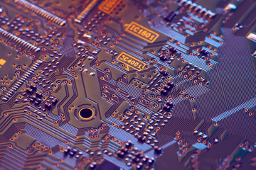 Electronic circuit board close up.