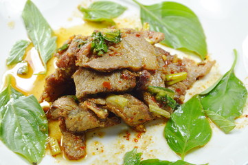 Thai spicy slice roasted pork salad on plate