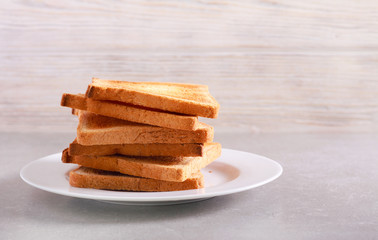 Pile of fresh toasts on plate
