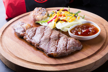 Grilled beef steak with salad