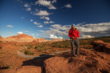 Fototapeta premium Hiker in Capitol reef National park in Utah, USA