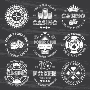 Poker and casino white gambling emblems on dark