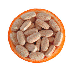orange and tablets, organic vitamins for health, citrus fruits and medicines