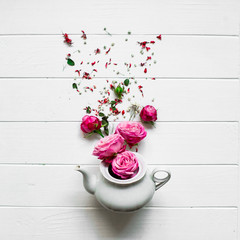 studio photo, white tea and flowers