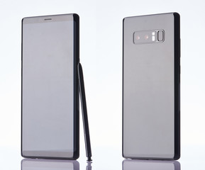 Modern black smartphone with stylus