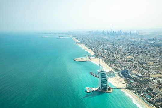 Aerial view of Dubai coast line on a beautiful sunny day.