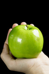 Grüner Apfel in Hand 3
