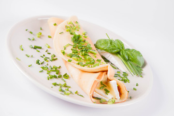 Pancake with brie cheese and chives