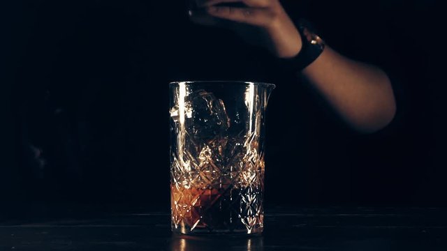 Bartender prepares a cocktail