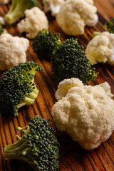 cauliflower and broccoli on a rustic background