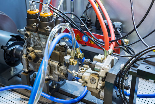Stand for checking and adjusting injection pump.