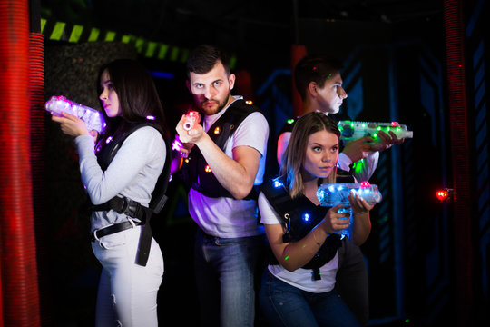Group of people on  laser tag arena