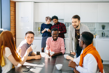 closeup photo of business tea meeting in the room with modern interior