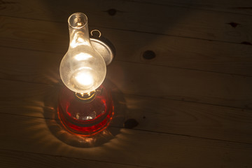 Old oil lamp on the wall