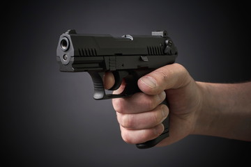 aiming handgun