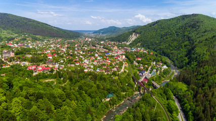 Aerial view of Carpathian mountains in summer. Village in the mountains.