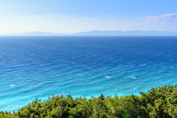 Fototapeta na wymiar Azure sea water of Rhodes bay in northern part of island. Greece
