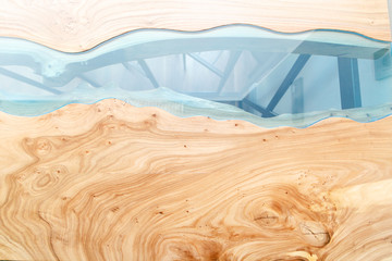 Top view of wood for background. Texture of a wooden table with epoxy resin.