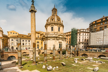 Obraz premium Wiev to Church of the Most Holy Name of Mary at the Trajan Forum and Trajan's Column in the near of Piazza Venezia in Rome. Italy capital landmarks