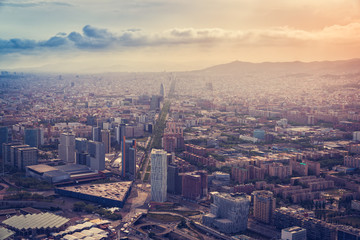 Aerial Barcelona skyline view with skyscrapers, Spain. Vintage colors with light leak