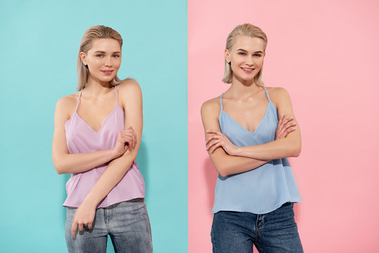 Portrait of two joyful women posing in sleeveless shirts, they are looking at camera with smile