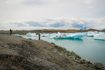 People photographing Jokulsarlon Glacier Lagoon Lake, Iceland