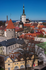 Obraz premium Tallinn Old Town on Toompea Hill, Estonia, panoramic view with traditional red tile roofs, medieval churches and walls