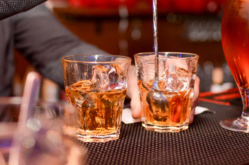 strong alcohol with ice in a glass