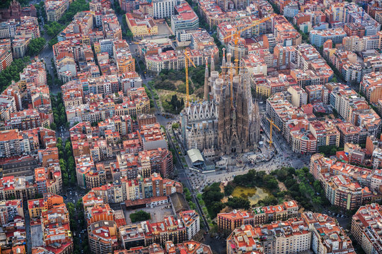 Barcelona Eixample residencial district, Sagrada familia, typical urban squares, Spain. Aerial view