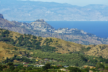 The pictures landscape of Sicily coast with Castelmola, Taormina and Giardini Naxos towns view in the background.Sicily, Italy