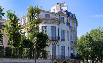 The traditional facade of Parisian building, France.