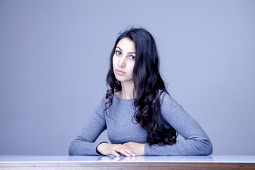 Time to work. Portrait of young attractive female recruiter waiting for job interview. (employment, salary, security, hope, business concept)