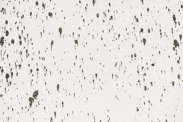 full frame image of white wall with cement splashes background