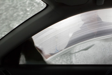 washing the machine with soap in the car workshop. from the car