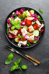 Salad with chicken meat. Fresh vegetable salad with chicken breast. Meat salad with chicken fillet and fresh vegetables on plate