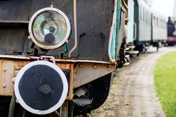 Fototapeta na wymiar Old locomotive lighting. The lamp used to illuminate the road through the old steam locomotives.