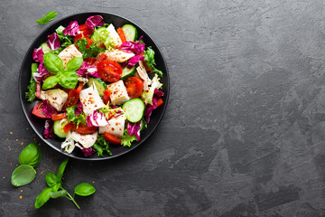 Salad with chicken meat. Fresh vegetable salad with chicken breast. Meat salad with chicken fillet and fresh vegetables on plate