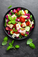 Salad with chicken meat. Fresh vegetable salad with chicken breast. Meat salad with chicken fillet and fresh vegetables on plate