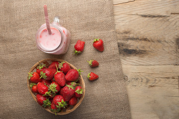 Strawberry yogurt with strawberries, top view with empty space for writing