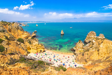 Lagos, Portugal - June, 09, 2015 - Enjoying a wonderful sunny day on the beach. Located in Algarve, Camilo Beach is one of the most famous and beautiful beaches in this area.