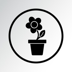 Flower in pot, black round icon. Vector illustration