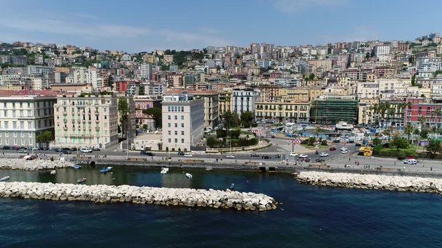 Aerial static footage of Naples boulevard in Italian Napoli is third-largest municipality in Italy after Rome and one of largest metropolises on Tyrrhenian Sea which is part of Mediterranean Sea 4k
