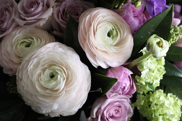 Bouquet of ranunculus and roses. Close up