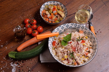 Bowl with rice salad and seasoning