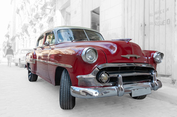 Red retro car in Havana Cuba