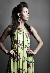 Fashion model in bright  dress